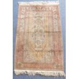 A hand-knotted (probably silk mixture) Persian-style prayer rug (signed and with Arabic script to