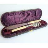 A late 19th century cased set of fish servers; silver-plate blades and carved ivory handles (slice