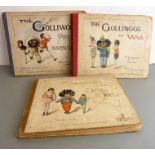 Three hardbound Florence K. Upton volumes: 'The Adventures of Two Dutch Dolls', 'The Golliwogg in