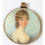 Attributed to FREDERICK BUCK (Irish, 1771-1840); a fine circular portrait miniature on ivory with