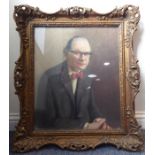 J W YOUNG; a half-length oil on canvas portrait of a gentleman wearing a red bowtie and striped