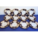 A set of 12 early 20th century fine Coalport porcelain dessert plates: raised, beaded gild rims;