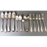 A selection of hallmarked silver flatware; to include serving spoons, table forks and a fiddle and