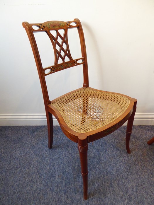 A single Edwardian period satinwood revival bedroom chair; the top rail decorated with roses above a