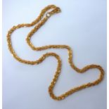 An ornate chain link necklace, the hook clasp stamped '22K' (length 45cm; gross weight 19.1g)  (