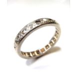 A diamond full hoop eternity ring, set all round with brilliant-cut diamonds, size P, (gross