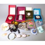 An assortment of collectable items: to include four enamelled boxes in their original cases and with