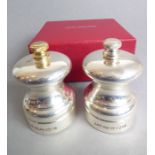 Silver Editions, a boxed hallmarked silver capstan salt and pepper mill set