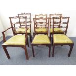 A set of six (4+2) mahogany ladderback chairs in 18th century style; probably first half of 20th