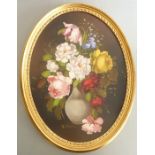 R. ROSINI, an oval gilt framed oil on artists board still life study of flowers in a baluster-shaped