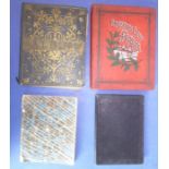 Two late 19th century bound Christmas card albums, an unbound album of crests and a black-leather