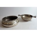 Two pieces of early 20th century hallmarked silver: a circular dish and a two-handled porringer of