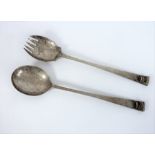 A pair of hallmarked silver salad servers; probably by Elkington & Co. Ltd, assayed 1904 (26cm,