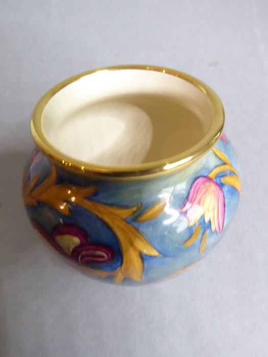 A miniature Moorcroft vase; finely hand-painted enamel fired onto copper, decorated with florid - Image 3 of 5