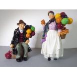 Two hand-decorated Royal Doulton porcelain figure models: 'Biddy Pennyfarthing' (H.N. 1843) and 'The