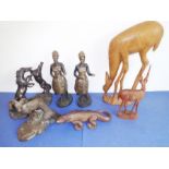 Three carved wood animals and five composition sculptures to include two 'Guy's Hospital Sisters' (