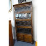 An early 20th Globe Wernicke-style bookcase; the outset cornice above four graduated sections with