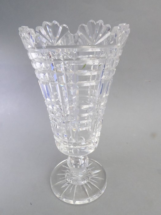 A fine Waterford crystal vase of conical form; scallop-shell style decoration to the lip, hobnail-