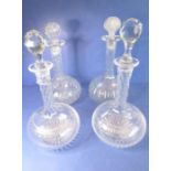 Two pairs of late 19th century globe-and-shaft decanters