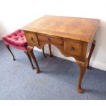 A good early 18th century-style (later) walnut-veneered lowboy together with a velour upholstered