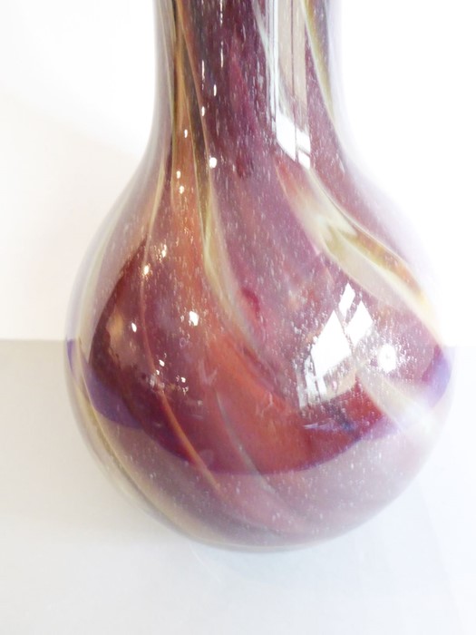 An oversized glass bottle vase decorated with brown, red and green multi-colour swirls and with - Image 2 of 5