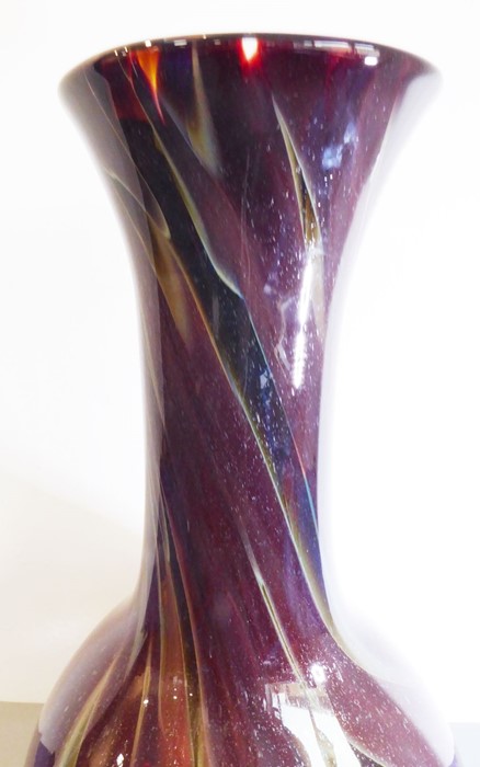 An oversized glass bottle vase decorated with brown, red and green multi-colour swirls and with - Image 3 of 5