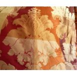 Two pairs of burgundy, orange and gold silk-style curtains edged with velvet and with tasselled