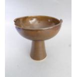 An interesting Studio pottery pedestal bowl; brown glaze, incised initials (probably AG) to the