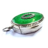 A silver and enamel pill box with marcasite decoration, London import marks for 1928, by Cohen &