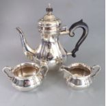 A three-piece Danish hallmarked silver coffee set comprising coffee pot, two-handled sugar and