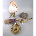 An interesting selection of four: a conch shell decorated with a cameo carving of Helios, set on