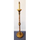 A parcel-gilt lamp standard; circular base raised on three bun-style feet (136cm including light