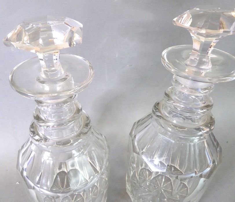 A pair of late Georgian ring-necked cut-glass decanters with original stoppers; together with two - Image 4 of 6