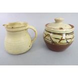 Two pieces of Studio pottery to include a small Winchcombe Pottery jug, possibly by Nina Davies, and