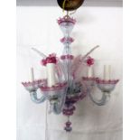 A Venetian-style five-light ceiling candelabra in cranberry and clear glass (49cm high x approx.