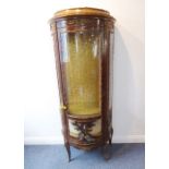 A good early / mid-20th century bow-fronted, walnut and gilt-metal-mounted, Louis XVI-style vitrine;