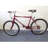 A 21-gear Fuji-Sunfire medium sized bicycle with crossbar; centre pull brakes and nearly new tyres