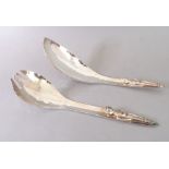 A pair of planished silver-plated salad servers;  'Acme' signed Bates & Son (American) (approx. 26.