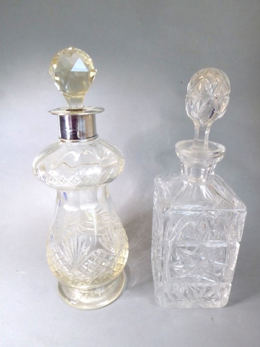 A fine hand-cut decanter with baluster-shaped lower body and circular star-cut foot, the