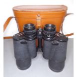 A good set of leather-cased Zenith 12 x 50 field glasses with coated optics, numbered 43459