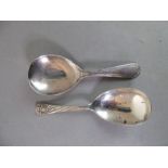 Two silver caddy spoons: Sheffield 1896 with maker's mark WSS and Sheffield 1944 with maker's mark
