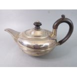 A hallmarked silver teapot of circular squat form; maker's mark W.N, assayed Chester 1904 (approx.