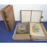 A 19th century folio containing loose and pasted watercolours, prints and feather découpage works; a