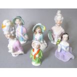 Six  hand-decorated porcelain pin dollies, mostly late 19th and early 20th century (6)