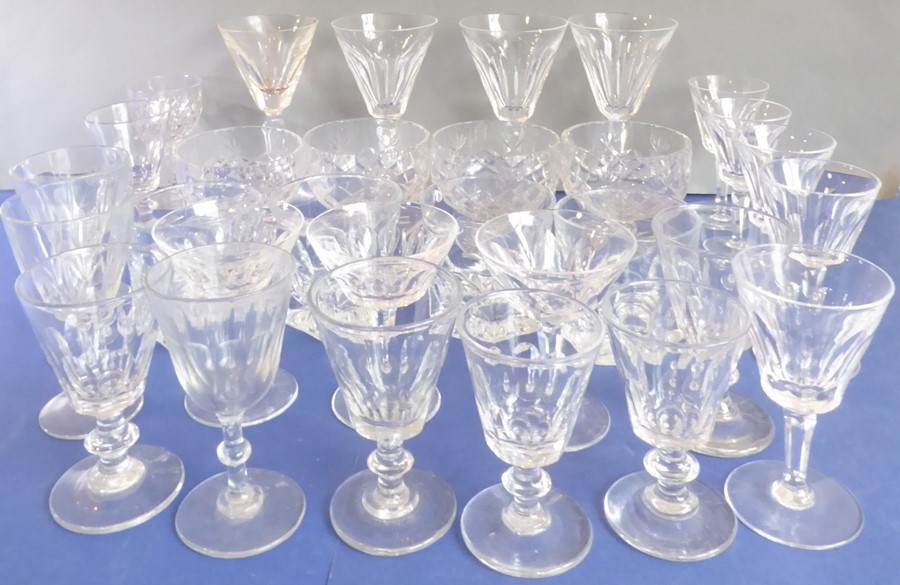 A good selection of hand-cut drinking glasses and a set of four sundae dishes