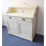 A late 19th / early 20th century painted pine washstand / side cabinet; three-quartered galleried