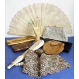Interesting collectable items to include two fans, a ring-stand in the form of a hand (probably