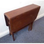 An Edwardian mahogany and satinwood crossbanded Sutherland table