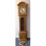 A fine and modern solid oak-cased eight-day longcase clock; the broken arch dial with moon phase