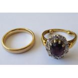 An oval amethyst and single-cut diamond-set cluster ring to the 18-carat yellow-gold shank